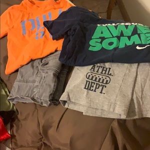 2 boys shirt/short sets shirts are 6-7, shorts 4-6